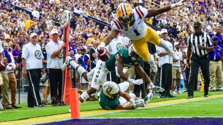 LSU wide receiver Ja’Marr Chase catches a 9-yard touchdown pass from quarterback Joe Burrow to give Tigers a 7-0 lead over Southeastern Louisiana in the first quarter Saturday night at Tiger Stadium.Lsu SoutheasternLSU wide receiver JaaTMMarr Chase catches a 9-yard touchdown pass from quarterback Joe Burrow to give Tigers a 7-0 lead over Southeastern Louisiana in the first quarter Saturday night at Tiger Stadium.