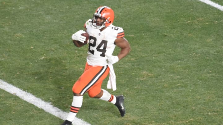 Jan 10, 2021; Pittsburgh, PA, USA; Cleveland Browns running back Nick Chubb (24) scores a touchdown against the Pittsburgh Steelers in the fourth quarter of an AFC Wild Card playoff game at Heinz Field. Mandatory Credit: Philip G. Pavely-USA TODAY Sports