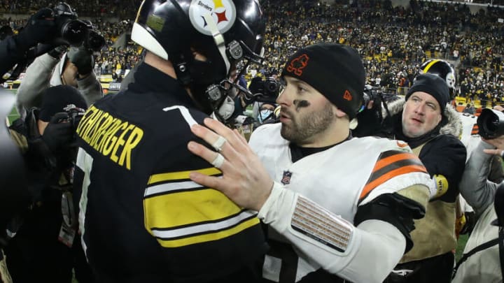 Jan 3, 2022; Pittsburgh, Pennsylvania, USA; Pittsburgh Steelers quarterback Ben Roethlisberger (left) and Cleveland Browns quarterback Baker Mayfield (right) embrace at mid-field after playing at Heinz Field. The Steelers won 26-14. Mandatory Credit: Charles LeClaire-USA TODAY Sports