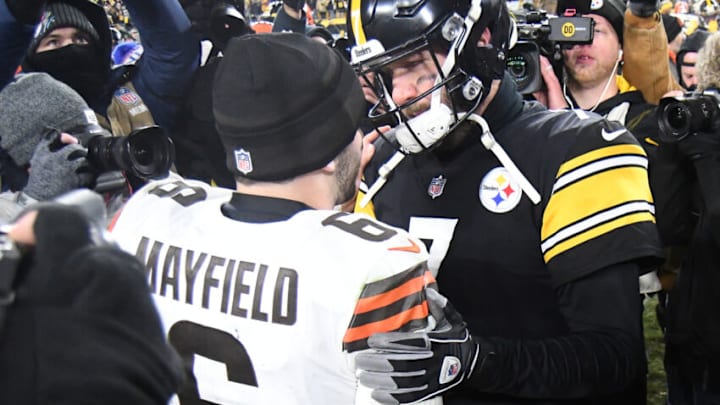 Jan 3, 2022; Pittsburgh, Pennsylvania, USA; Pittsburgh Steelers quarterback Ben Roethlisberger (7) meets with Cleveland Browns quarterback Baker Mayfield (6) after their game at Heinz Field. Mandatory Credit: Philip G. Pavely-USA TODAY Sports