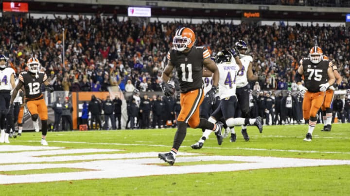 Dec 17, 2022; Cleveland, Ohio, USA; Cleveland Browns wide receiver Donovan Peoples-Jones (11) scores a touchdown against the Baltimore Ravens at FirstEnergy Stadium. Mandatory Credit: Scott Galvin-USA TODAY Sports