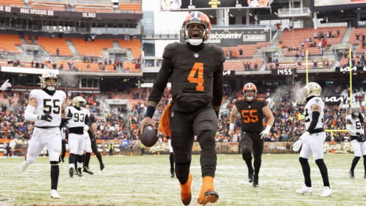 Dec 24, 2022; Cleveland, Ohio, USA; Cleveland Browns quarterback Deshaun Watson (4) runs for a touchdown against the New Orleans Saints during the second quarter at FirstEnergy Stadium. Mandatory Credit: Scott Galvin-USA TODAY Sports