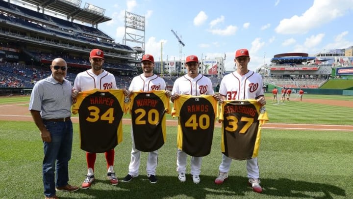Jul 6, 2016; Washington, DC, USA; Washington Nationals general manager Mike Rizzo poses for a photo with right fielder Bryce Harper (34), second baseman Daniel Murphy (20), catcher Wilson Ramos (40) and starting pitcher Stephen Strasburg (37) after they were presented with their All Star jersey