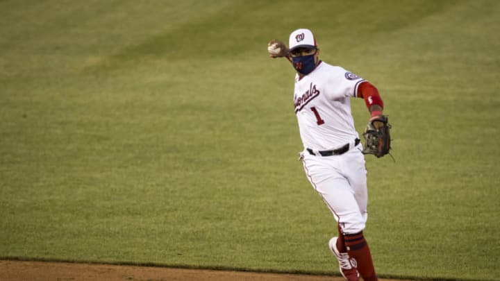 JULY 18: Wilmer Difo #1 of the Washington Nationals throws to first base during the eighth inning against the Philadelphia Phillies at Nationals Park on July 18, 2020 in Washington, DC. (Photo by Scott Taetsch/Getty Images)