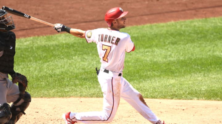 WASHINGTON, DC - AUGUST 23: Trea Turner #7 of the Washington Nationals triples in two runs in the sixth inning during a baseball game against the Miami Marlins at Nationals Park on August 23, 2020 in Washington, DC. (Photo by Mitchell Layton/Getty Images)