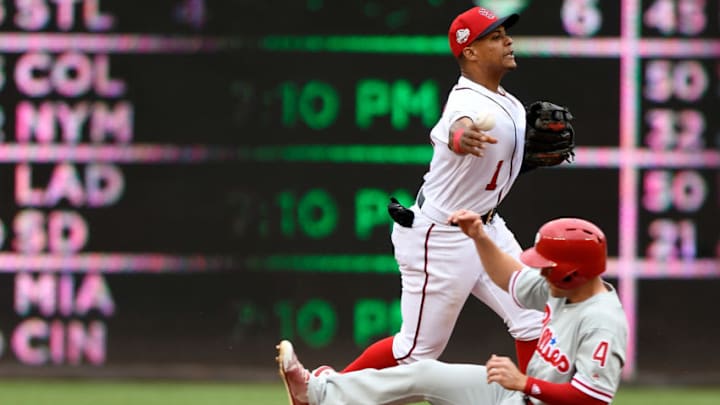 WASHINGTON, DC - MAY 05: Wilmer Difo #1 of the Washington Nationals forces out Scott Kingery #4 of the Philadelphia Phillies to start a double play in the second inning at Nationals Park on May 5, 2018 in Washington, DC. (Photo by Greg Fiume/Getty Images)