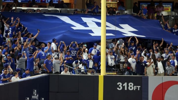 Sep 12, 2016; Bronx, NY, USA; Los Angeles Dodgers fans raise a banner behind the left field foul pole during the third inning against the New York Yankees at Yankee Stadium. Mandatory Credit: Brad Penner-USA TODAY Sports