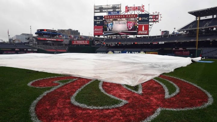 Oct 8, 2016; Washington, DC, USA; The tarp covers the infield before game two of the 2016 NLDS playoff baseball game between the Washington Nationals and the Los Angeles Dodgers at Nationals Park. Mandatory Credit: Brad Mills-USA TODAY Sports