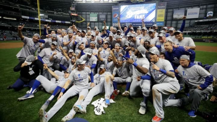 MILWAUKEE, WI - OCTOBER 20: The Los Angeles Dodgers celebrate after defeating the Milwaukee Brewers in Game Seven to win the National League Championship Series at Miller Park on October 20, 2018 in Milwaukee, Wisconsin. (Photo by Jonathan Daniel/Getty Images)