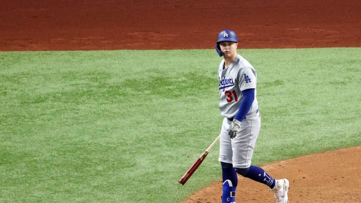 ARLINGTON, TEXAS – OCTOBER 25: Joc Pederson #31 of the Los Angeles Dodgers watches his solo home run leave the park against the Tampa Bay Rays during the second inning in Game Five of the 2020 MLB World Series at Globe Life Field on October 25, 2020 in Arlington, Texas. (Photo by Sean M. Haffey/Getty Images)