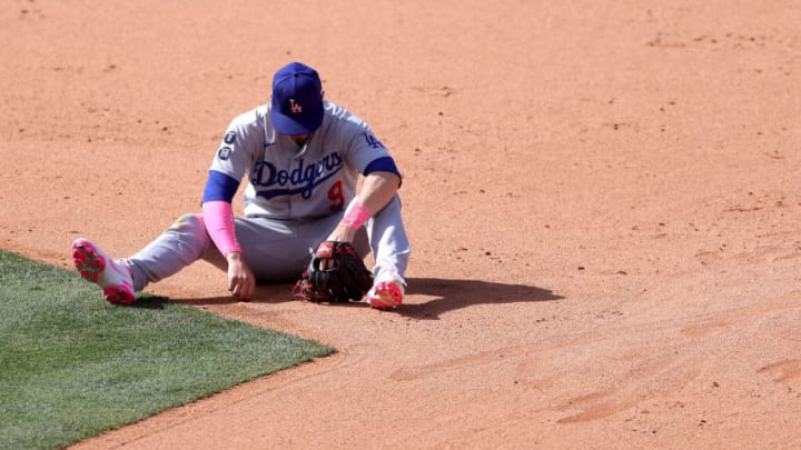 ANAHEIM, CALIFORNIA - MAY 09: Gavin Lux #9 of the Los Angeles Dodgers looks on after he was unable to handle the throw to tag out David Fletcher #22 of the Los Angeles Angels as he stole second base during the eighth inning of a game at Angel Stadium of Anaheim on May 09, 2021 in Anaheim, California. (Photo by Sean M. Haffey/Getty Images)