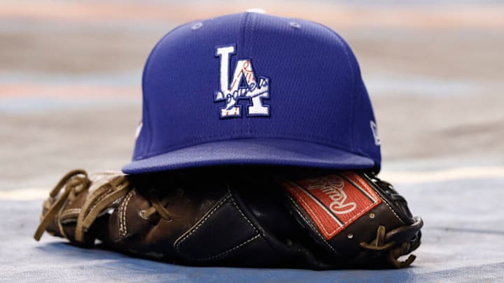 MIAMI, FLORIDA - JULY 06: A detail of a Los Angeles Dodgers hat during batting practice prior to the game against the Miami Marlins at loanDepot park on July 06, 2021 in Miami, Florida. (Photo by Michael Reaves/Getty Images) MIAMI, FLORIDA - JULY 06: A detail of a Los Angeles Dodgers hat during batting practice prior to the game against the Miami Marlins at loanDepot park on July 06, 2021 in Miami, Florida. (Photo by Michael Reaves/Getty Images)