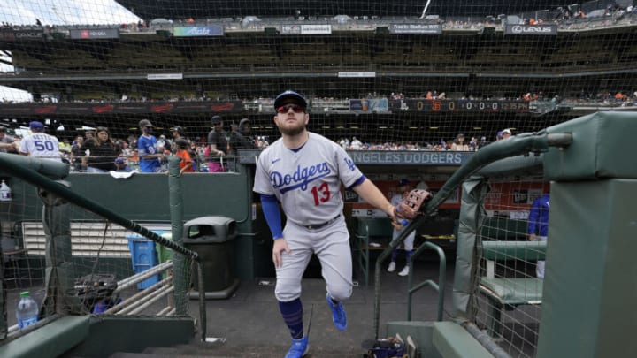 SAN FRANCISCO, CALIFORNIA - JULY 29: Max Muncy #13 of the Los Angeles Dodgers looks on from the dugout steps prior to the start of the game against the San Francisco Giants at Oracle Park on July 29, 2021 in San Francisco, California. (Photo by Thearon W. Henderson/Getty Images)