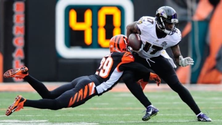 Jan 3, 2016; Cincinnati, OH, USA; Baltimore Ravens wide receiver Jeremy Butler (17) carries the ball as Cincinnati Bengals strong safety Leon Hall (29) defends during the second quarter at Paul Brown Stadium. Mandatory Credit: Joshua Lindsey-USA TODAY Sports
