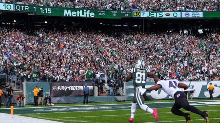 Oct 23, 2016; East Rutherford, NJ, USA; New York Jets wide receiver Quincy Enunwa (81) runs for a touchdown after catching a pass from Geno Smith (not shown) during the first half of their game against the Baltimore Ravens at MetLife Stadium. Mandatory Credit: Ed Mulholland-USA TODAY Sports