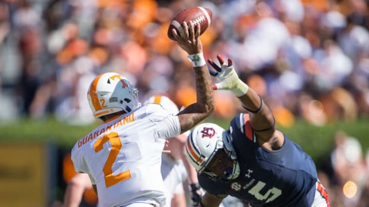 AUBURN, AL – OCTOBER 13: Defensive lineman Derrick Brown #5 of the Auburn Tigers looks to block a pass from quarterback Jarrett Guarantano #2 of the Tennessee Volunteers at Jordan-Hare Stadium on October 13, 2018 in Auburn, Alabama. (Photo by Michael Chang/Getty Images)