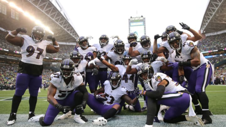 SEATTLE, WASHINGTON - OCTOBER 20: The Baltimore Ravens celebrate a 18 yard fumble recovery touchdown by Marlon Humphrey #44 of the Baltimore Ravens in the fourth quarter against the Seattle Seahawks at CenturyLink Field on October 20, 2019 in Seattle, Washington. (Photo by Abbie Parr/Getty Images)