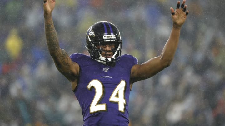 BALTIMORE, MARYLAND – DECEMBER 29: Cornerback Marcus Peters #24 of the Baltimore Ravens acknowledges the crowd against the Pittsburgh Steelers during the first quarter at M&T Bank Stadium on December 29, 2019, in Baltimore, Maryland. (Photo by Scott Taetsch/Getty Images)