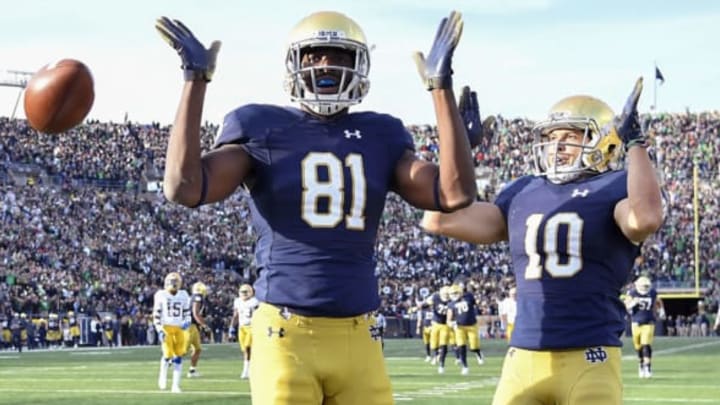 SOUTH BEND, IN – OCTOBER 13: Miles Boykin #81 of the Notre Dame Fighting Irish reacts with Chris Finke #10 after scoring the touchdown to take the lead against the Pittsburgh Panthers in the second half at Notre Dame Stadium on October 13, 2018 in South Bend, Indiana. (Photo by Quinn Harris/Getty Images)