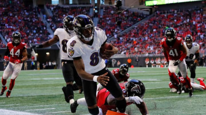 ATLANTA, GA – DECEMBER 02: Lamar Jackson #8 of the Baltimore Ravens rushes for a touchdown past Grady Jarrett #97 of the Atlanta Falcons at Mercedes-Benz Stadium on December 2, 2018 in Atlanta, Georgia. (Photo by Kevin C. Cox/Getty Images)