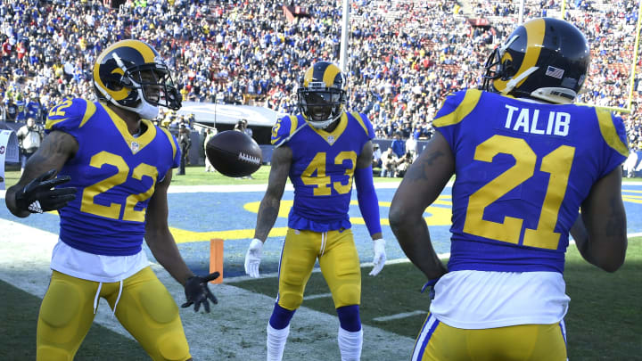 LOS ANGELES, CA – DECEMBER 30: Marcus Peters #22 celebrates intercepting the ball with John Johnson #43 and Aqib Talib #21 of the Los Angeles Rams against the San Francisco 49ers at Los Angeles Memorial Coliseum on December 30, 2018 in Los Angeles, California. Rams won 48-32. (Photo by John McCoy/Getty Images)