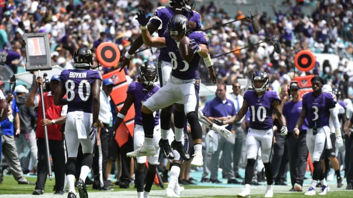 MIAMI, FL – SEPTEMBER 08: Willie Snead #83 of the Baltimore Ravens celebrates with Lamar Jackson #8 of the Baltimore Ravens after catching a 33 yard touchdown in the second quarter against the Miami Dolphins at Hard Rock Stadium on September 8, 2019 in Miami, Florida. (Photo by Eric Espada/Getty Images)