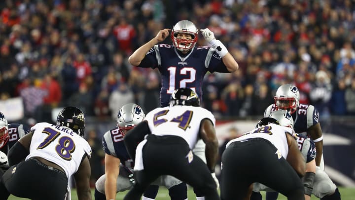 FOXBORO, MA – DECEMBER 12: Tom Brady #12 of the New England Patriots communicates at the line of scrimmage during the first half against the Baltimore Ravens at Gillette Stadium on December 12, 2016 in Foxboro, Massachusetts. (Photo by Adam Glanzman/Getty Images)