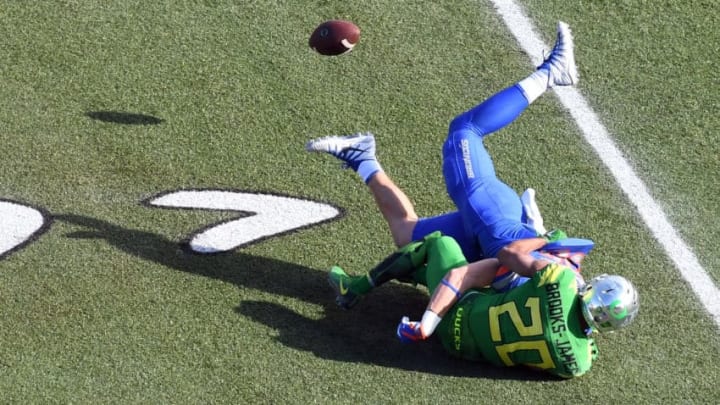 LAS VEGAS, NV - DECEMBER 16: Running back Tony Brooks-James #20 of the Oregon Ducks fumbles the ball as he is hit by linebacker Leighton Vander Esch #38 of the Boise State Broncos in the first half of the Las Vegas Bowl at Sam Boyd Stadium on December 16, 2017 in Las Vegas, Nevada. (Photo by Ethan Miller/Getty Images) LAS VEGAS, NV - DECEMBER 16: Running back Tony Brooks-James #20 of the Oregon Ducks fumbles the ball as he is hit by linebacker Leighton Vander Esch #38 of the Boise State Broncos in the first half of the Las Vegas Bowl at Sam Boyd Stadium on December 16, 2017 in Las Vegas, Nevada. (Photo by Ethan Miller/Getty Images)