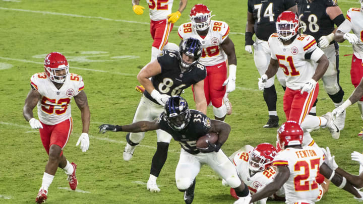 Sep 28, 2020; Baltimore, Maryland, USA; Baltimore Ravens running back Gus Edwards (35) rushes during the second half against the Kansas City Chiefs at M&T Bank Stadium. Mandatory Credit: Tommy Gilligan-USA TODAY Sports