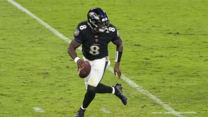 Sep 28, 2020; Baltimore, Maryland, USA; Baltimore Ravens quarterback Lamar Jackson (8) runs to throw during the first half against the Kansas City Chiefs at M&T Bank Stadium. Mandatory Credit: Tommy Gilligan-USA TODAY Sports