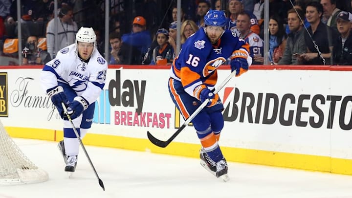 May 3, 2016; Brooklyn, NY, USA; New York Islanders right wing Steve Bernier (16) and Tampa Bay Lightning defenseman Slater Koekkoek (29) race for the puck in game three of the second round of the 2016 Stanley Cup Playoffs at Barclays Center. Tampa Bay Lightning won 5-4. Mandatory Credit: Anthony Gruppuso-USA TODAY Sports