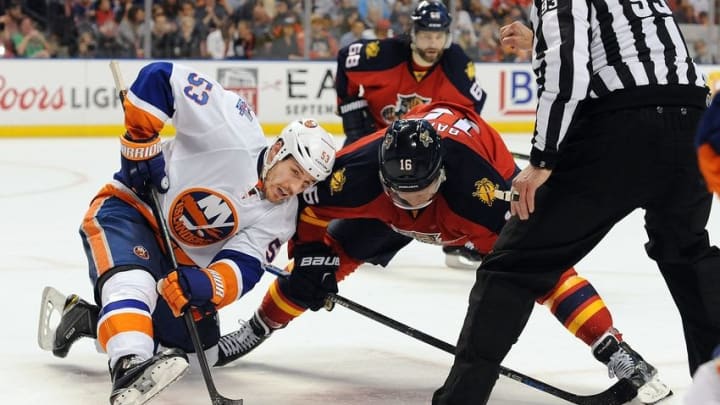 Apr 22, 2016; Sunrise, FL, USA; New York Islanders center Casey Cizikas (53) wins a face-off against Florida Panthers center Aleksander Barkov (16) during second period action in game five of the first round of the 2016 Stanley Cup Playoffs at BB&T Center. Mandatory Credit: Robert Duyos-USA TODAY Sports