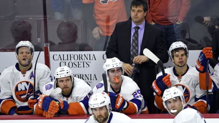 Apr 7, 2015; Philadelphia, PA, USA; New York Islanders head coach Jack Capuano stands behind his team on the bench after the Philadelphia Flyers scored the game-winning goal with three seconds left during the third period at Wells Fargo Center. The Flyers defeated the Islanders, 5-4. Mandatory Credit: Eric Hartline-USA TODAY Sports Apr 7, 2015; Philadelphia, PA, USA; New York Islanders head coach Jack Capuano stands behind his team on the bench after the Philadelphia Flyers scored the game-winning goal with three seconds left during the third period at Wells Fargo Center. The Flyers defeated the Islanders, 5-4. Mandatory Credit: Eric Hartline-USA TODAY Sports