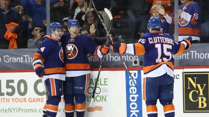 Oct 16, 2016; Brooklyn, NY, USA; New York Islanders right wing Josh Bailey (12) celebrates scoring the game winning goal in overtime against the Anaheim Ducks at Barclays Center. New York Islanders won 3-2 in overtime. Mandatory Credit: Anthony Gruppuso-USA TODAY Sports