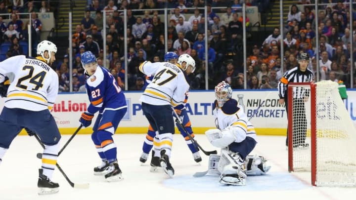Apr 4, 2015; Uniondale, NY, USA; Buffalo Sabres goalie Andrey Makarov (1) looks back on a missed save shot by New York Islanders right wing Kyle Okposo (21) (not shown) during the first period at Nassau Veterans Memorial Coliseum. Mandatory Credit: Anthony Gruppuso-USA TODAY Sports