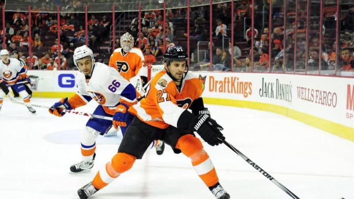 Sep 27, 2016; Philadelphia, PA, USA; Philadelphia Flyers center Boyd Gordon (27) and New York Islanders right wing Josh Ho-Sang (66) battles for the puck during the second period during a preseason hockey game at Wells Fargo Center. Mandatory Credit: Eric Hartline-USA TODAY Sports