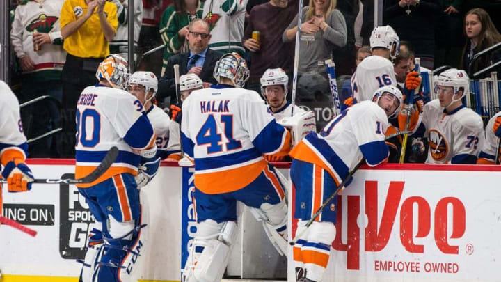 Dec 29, 2016; Saint Paul, MN, USA; New York Islanders goalie Jaroslav Halak (41) is pulled from the game in favor of goalie Jean-Francois Berube (30) during the second period against the Minnesota Wild at Xcel Energy Center. Mandatory Credit: Brace Hemmelgarn-USA TODAY Sports