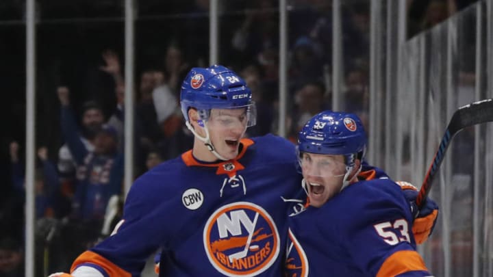 UNIONDALE, NEW YORK - FEBRUARY 28: Casey Cizikas #53 of the New York Islanders (r) scores a short-handed goal at 13:40 of the second period against the Toronto Maple Leafs and is joined by Scott Mayfield #24 (l) at NYCB Live's Nassau Coliseum on February 28, 2019 in Uniondale City. (Photo by Bruce Bennett/Getty Images) UNIONDALE, NEW YORK - FEBRUARY 28: Casey Cizikas #53 of the New York Islanders (r) scores a short-handed goal at 13:40 of the second period against the Toronto Maple Leafs and is joined by Scott Mayfield #24 (l) at NYCB Live's Nassau Coliseum on February 28, 2019 in Uniondale City. (Photo by Bruce Bennett/Getty Images)