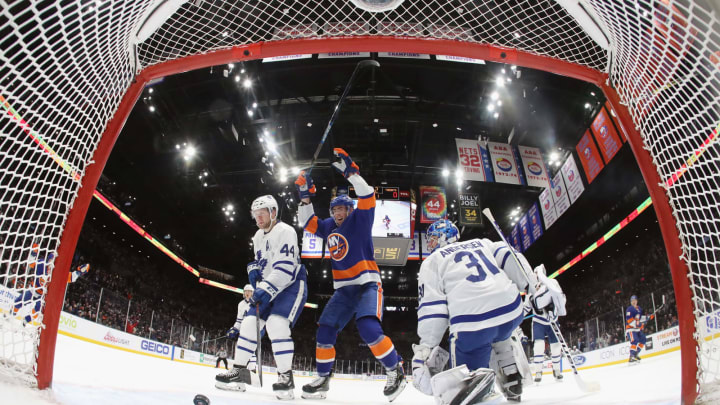 UNIONDALE, NEW YORK – NOVEMBER 13: Mathew Barzal #13 and Brock Nelson #29 of the New York Islanders celebrate a power-play goal by Anthony Beauvillier #18 against Frederik Andersen #31 of the Toronto Maple Leafs at NYCB Live’s Nassau Coliseum on November 13, 2019 in Uniondale, New York. (Photo by Bruce Bennett/Getty Images)
