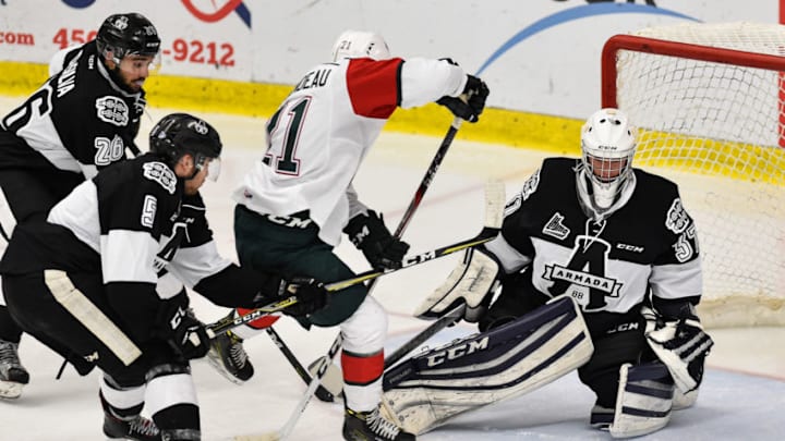 BOISBRIAND, QC - OCTOBER 20: Goaltender Emile Samson #37 of the Blainville-Boisbriand Armada makes a save on Arnaud Durandeau #21 of the Halifax Mooseheads during the QMJHL game at Centre d'Excellence Sports Rousseau on October 20, 2017 in Boisbriand, Quebec, Canada. (Photo by Minas Panagiotakis/Getty Images) BOISBRIAND, QC - OCTOBER 20: Goaltender Emile Samson #37 of the Blainville-Boisbriand Armada makes a save on Arnaud Durandeau #21 of the Halifax Mooseheads during the QMJHL game at Centre d'Excellence Sports Rousseau on October 20, 2017 in Boisbriand, Quebec, Canada. (Photo by Minas Panagiotakis/Getty Images)