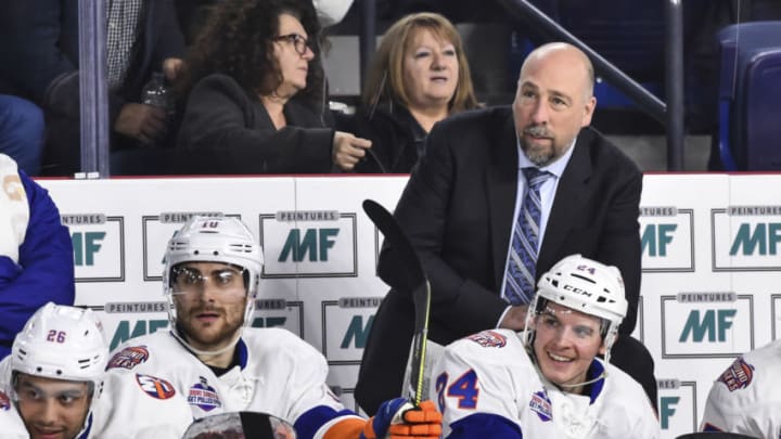 LAVAL, QC - MARCH 02: Head coach of the Bridgeport Sound Tigers Brent Thompson looks on from behind the bench against the Laval Rocket during the AHL game at Place Bell on March 2, 2018 in Laval, Quebec, Canada. The Bridgeport Sound Tigers defeated the Laval Rocket 4-2. (Photo by Minas Panagiotakis/Getty Images)