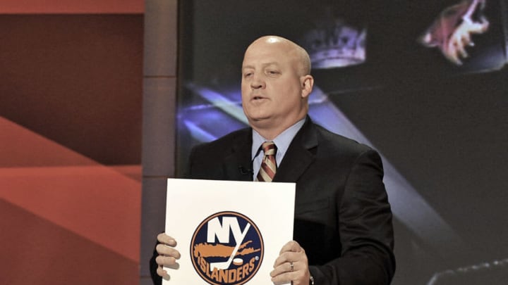TORONTO - APRIL 7: NHL Deputy Commissioner Bill Daly holds up a NHL Draft lottery card April 7, 2008 at the TSN Studios in Toronto, Ontario, Canada. (Photo by Graig Abel/Getty Images for the NHL)