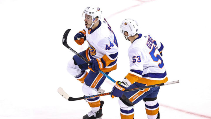 TORONTO, ONTARIO - AUGUST 26: Jean-Gabriel Pageau #44 of the New York Islanders is congratulated by his teammate, Casey Cizikas #53, after scoring the game-tying goal against the Philadelphia Flyers during the third period in Game Two of the Eastern Conference Second Round during the 2020 NHL Stanley Cup Playoffs at Scotiabank Arena on August 26, 2020 in Toronto, Ontario. (Photo by Elsa/Getty Images)