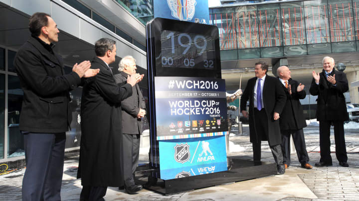 Mar 2, 2016; Toronto, Ontario, Canada; Toronto mayor John Tory (third from right) unveils a countdown clock for the upcoming 2016 World Cup of Hockey in Toronto. Looking on from left are Team Europe general manager Miroslav Satan, former World Cup participants Pat Lafontaine and Darryl Sittler , NHL deputy commissioner Bill Daly (second from right) and NHL players association director Don Fehr (far right). Mandatory Credit: Dan Hamilton-USA TODAY Sports