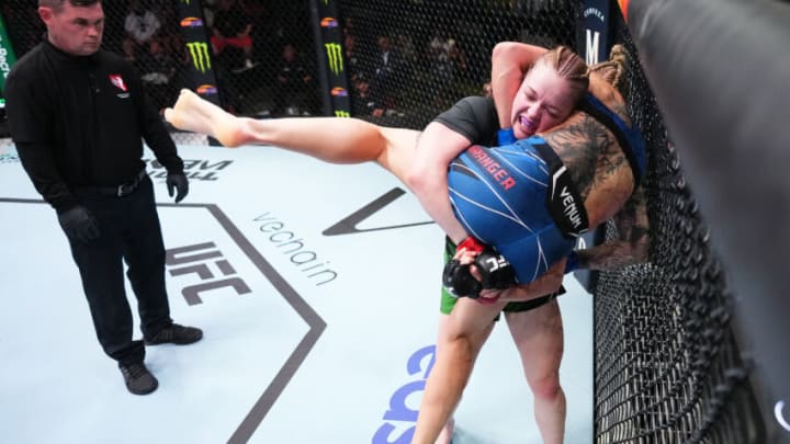 LAS VEGAS, NEVADA - AUGUST 06: Cory McKenna of Wales prepares to take down Miranda Granger in a strawweight fight during the UFC Fight Night event at UFC APEX on August 06, 2022 in Las Vegas, Nevada. (Photo by Chris Unger/Zuffa LLC) LAS VEGAS, NEVADA - AUGUST 06: Cory McKenna of Wales prepares to take down Miranda Granger in a strawweight fight during the UFC Fight Night event at UFC APEX on August 06, 2022 in Las Vegas, Nevada. (Photo by Chris Unger/Zuffa LLC)