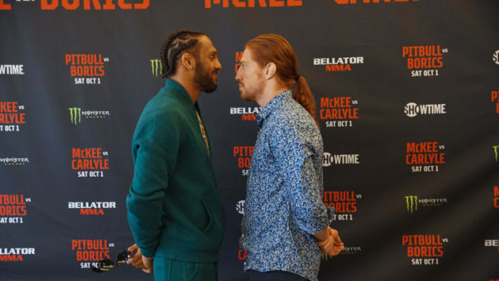 LOS ANGELES, CA - SEPTEMBER 29: AJ McKee (L) vs. Spike Carlyle (R) face-off for the first time ahead of their bout during the Bellator 286 media day on September 29, 2022, at the Sheraton Gateway Los Angeles Hotel in Los Angeles, CA. (Photo by Amy Kaplan/Icon Sportswire)
