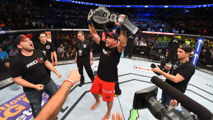 MEXICO CITY, MEXICO - JUNE 13: Fabricio Werdum of Brazil celebrates after submitting Cain Velasquez of the United States in their UFC heavyweight championship bout during the UFC 188 event inside the Arena Ciudad de Mexico on June 13, 2015 in Mexico City, Mexico. (Photo by Josh Hedges/Zuffa LLC/Zuffa LLC via Getty Images)