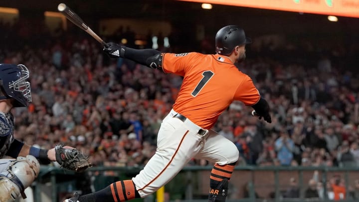 SAN FRANCISCO, CA – AUGUST 30: Kevin  Pillar #1 of the San Francisco Giants hits a sacrifice fly scoring Evan Longoria against the San Diego Padres in the bottom of the seventh inning at Oracle Park on August 30, 2019 in San Francisco, California. The Giants won the game 8-3. (Photo by Thearon W. Henderson/Getty Images)