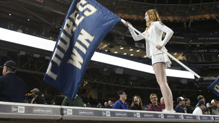 SAN DIEGO, CALIFORNIA - MAY 2: A member of the Pad Squad holds up a banner after the San Diego Padres beat the Colorado Rockies at PETCO Park on May 2, 2016 in San Diego, California. (Photo by Denis Poroy/Getty Images) *** Local Caption ***