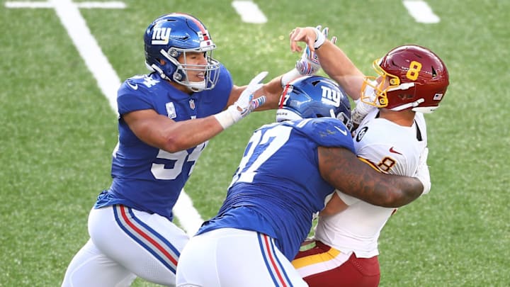 EAST RUTHERFORD, NEW JERSEY – OCTOBER 18: Dexter Lawrence #97 of the New York Giants pressures Kyle Allen #8 of the Washington Football Team as he’s unable to convert a two-point play at MetLife Stadium on October 18, 2020 in East Rutherford, New Jersey. (Photo by Mike Stobe/Getty Images)